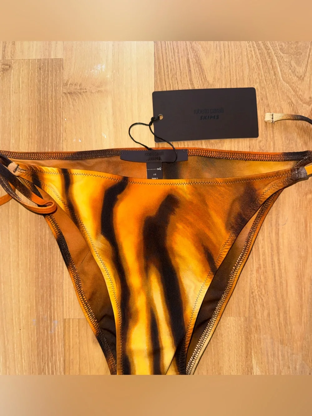 SKIMS Roberto Cavalier Dipped Tie Bottom in tiger face print size Large